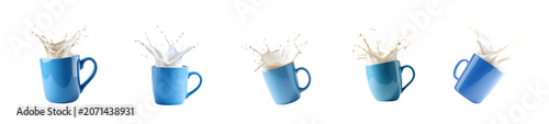 A dynamic studio shot captures a bright blue ceramic mug tilted to the right, with a dramatic splash of white milk erupting from its opening