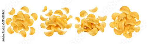 A pile of potato chips is arranged in a dynamic, overlapping manner against a stark on transparent background