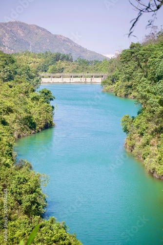 Photos A scenic view of the emerald green waters and concrete dam at Wong Nai Tun Reservoir in Hong Kong