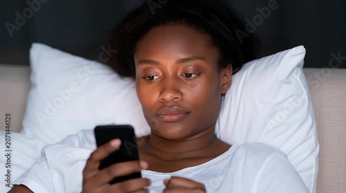 Gorgeous African light Brown woman is texting on the dating app