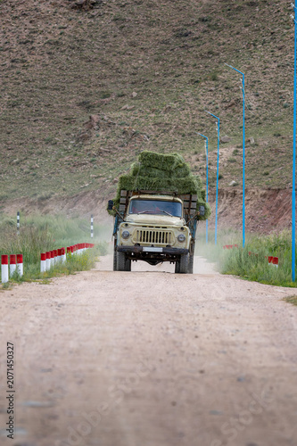 Old Truck Transporting Hay in Kyrgyzstan