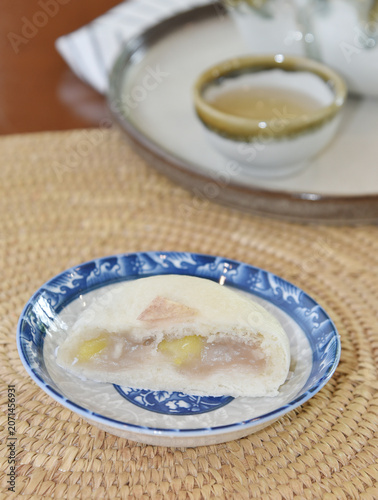 Chinese bun with a bite mark