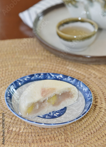 Chinese bun with a bite mark