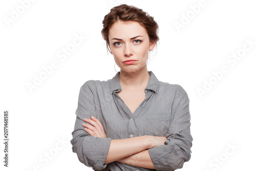 Woman with crossed arms looking serious isolated on transparent background.