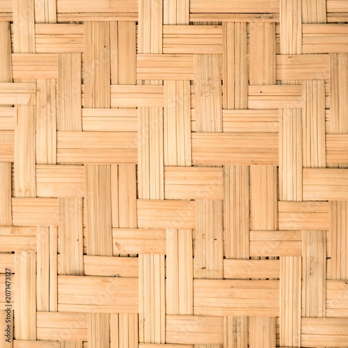 Fotografie light tan woven bamboo basketry block pattern background