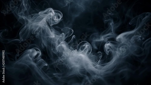 Abstract white smoke swirling on dark background with misty texture and atmospheric effect design