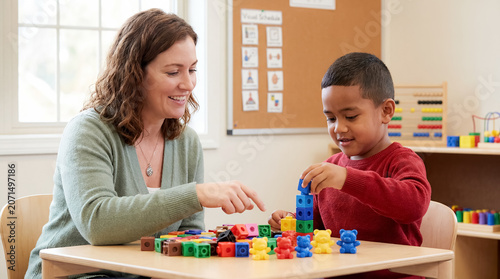 special education teacher student inclusive classroom presenting a special education teacher in an engaging education moment focused on adaptive teaching and individual student support plus small