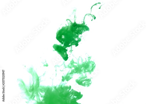 Green color dye melt on white background,Abstract smoke pattern,Colored liquid dye,Splash paint