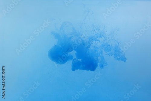 Blue color dye melt on white background,Abstract smoke pattern,Colored liquid dye,Splash pain