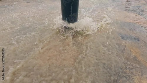 Powerful river current after seasonal rainfall