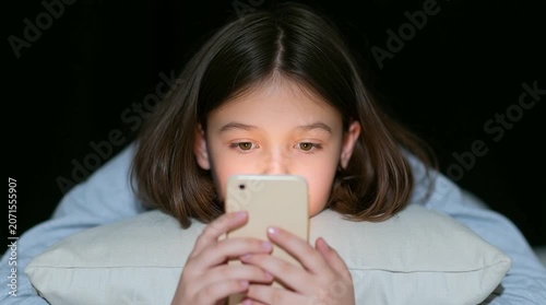 Leisure of a preteen girl in puberty period: chatting with friends and classmates