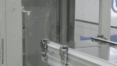 Conveyor rail system. Material box handling, Industrial automation. Precision transport system in Smart factory.