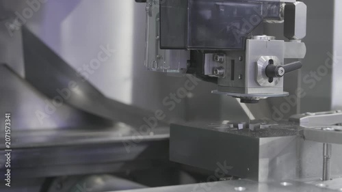 EDM Wire cutting machine working, Closeup Wire Electrical Discharge Machining high precision cut.