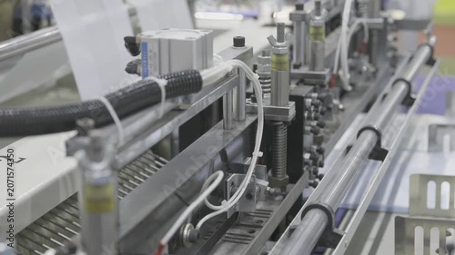Industry machine working, Plastic bag shopping bag production machine, Factory machine working. Manufacturing system, Industrial automation, Production line.
