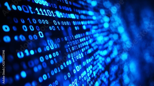 Bright blue digital binary code glowing on a dark screen representing data stream technology with a beautiful depth of field