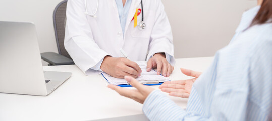 World hepatitis day awareness month, 28 July. Doctor and patient having medical consultation for Red and Yellow ribbon for Liver cancer, Jaundice, Cirrhosis, Failure, Enlarged, Hepatic Encephalopathy