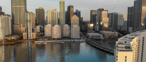 MIAMI - MARCH 31, 2018: Brickell Key and Downtown Miami aerial view. The city attracts 20 million tourists annually