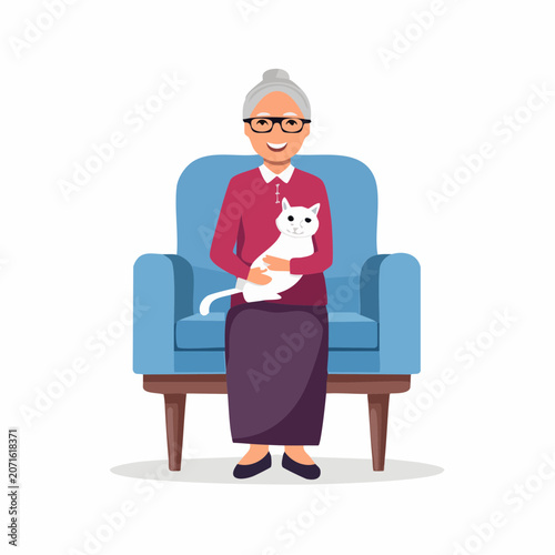Smiling grandmother sitting in armchair holding a white cat