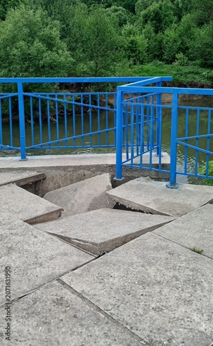 A destroyed observation deck located by the river