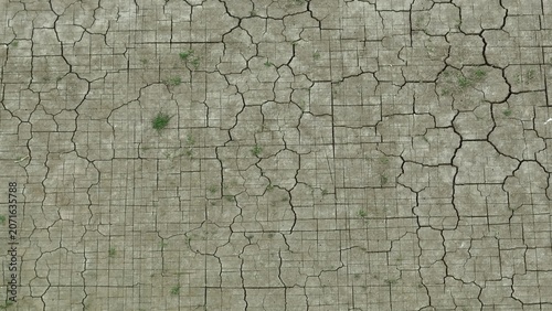 Tableau sur toile Drone perspective of dry, fragmented ground with visible cracking, representing prolonged drought conditions, reduced soil moisture, and ecological imbalance