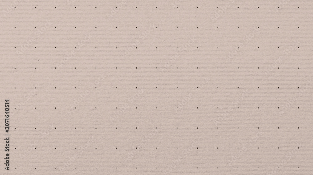 Fototapeta premium Light pink textured paper background with subtle horizontal lines and small dots.
