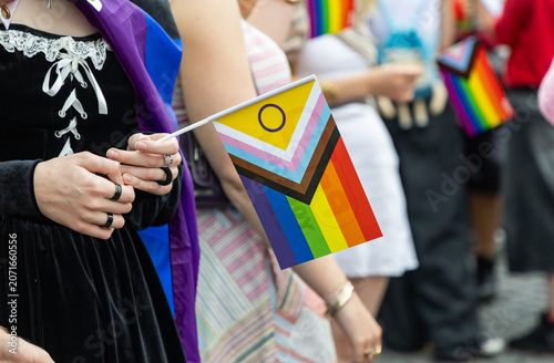 Fotografie pride with rainbow flag - symbol of love and tolerance
