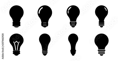 Black and white lightbulb icons set - Eight stylish lightbulb icons in black and white for creative projects and presentations.