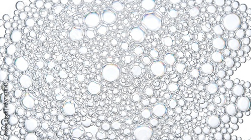 Close-up of white foam bubbles on a clear surface