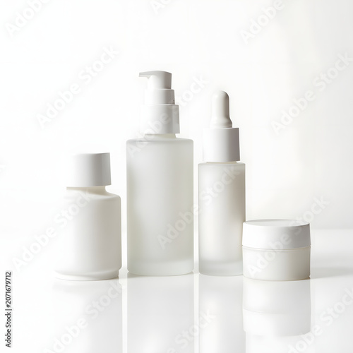 Set of Luxury Cosmetic Bottles and Containers on White Background, Professional Beauty Product Photography
