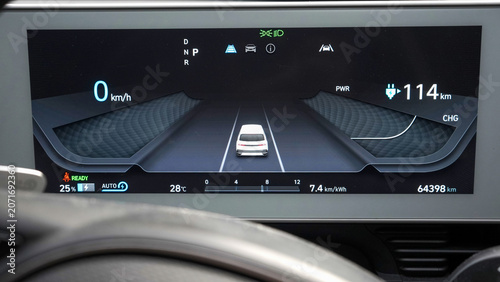 Modern Electric Vehicle Digital Dashboard Displaying Battery Range and UI System