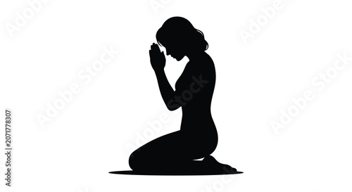 Fotografie Praying woman in kneeling position a black silhouette against a white background