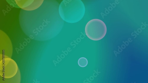 Vibrant green and blue background with yellow and white bokeh lights shining