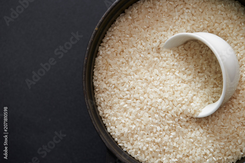 Raw rice in a cast iron pot