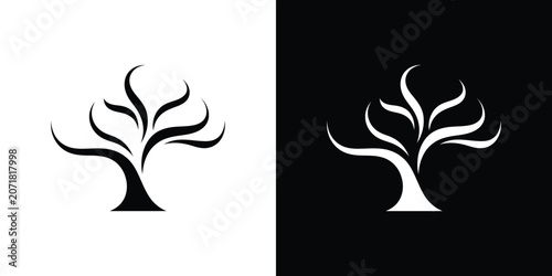 Black and white tree on contrasting backgrounds silhouette symbol minimalistic