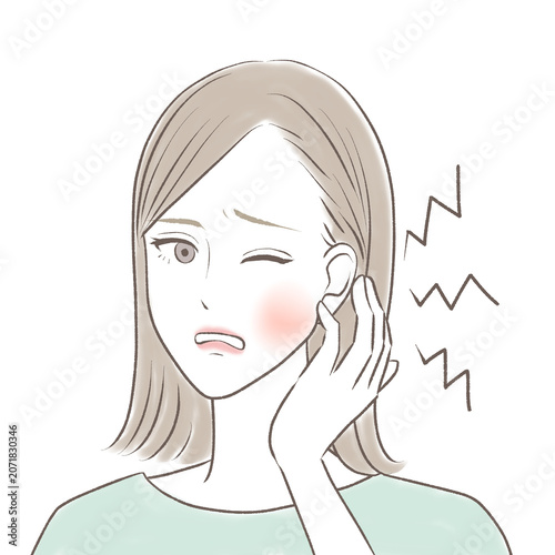 歯が痛くて困っている女性