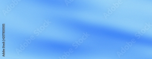Abstract blue gradient background with soft grainy texture