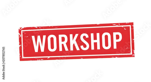 A bold red workshop sign with white uppercase letters, framed by a metallic border, symbolizing creativity, craftsmanship, and hands-on creation for artisans and builders alike