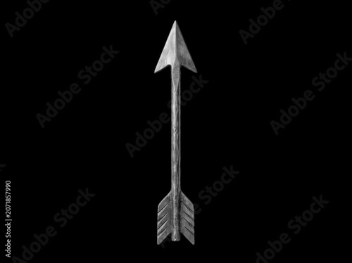 Ancient arrow with feathered fletching in dramatic lighting against a void concept of direction isolated on transparent background