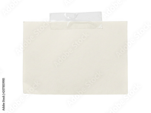 Blank paper note with clear tape attached to a surface during a studio session isolated on transparent background