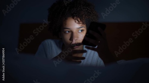 A preteen girl is taking a selfie to verify her age for social media. A teenage is going through age verification to create a social media account