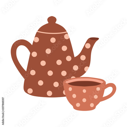 Polka dot teapot and cup serving hot beverage