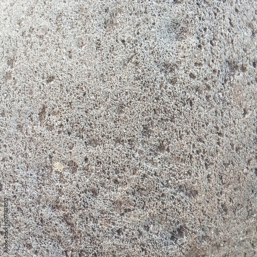 Natural rough gray stone texture surface background viewed from above