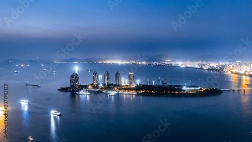 Night view timelapse of Phoenix Island in Sanya Bay, Hainan, China