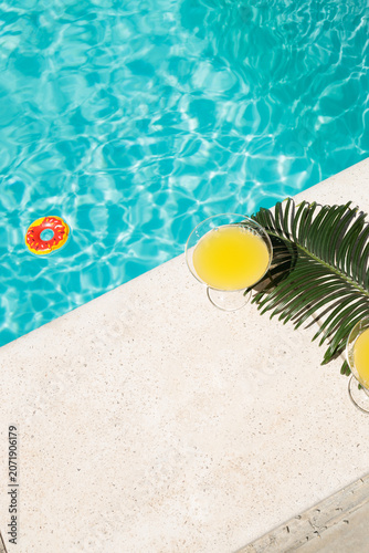 swimming pool in the tropical resort, cocktails with umbrellas by the pool, spa