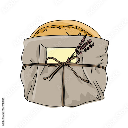 Paper wrapping a loaf of bread and a ribbon, dry lavender flower, a card for gift. Food for gift
