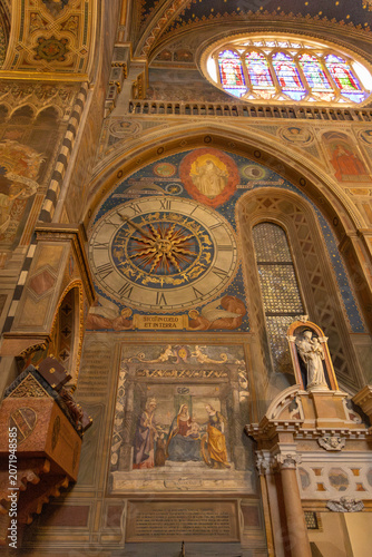 Padua Cathedral interior with clock, statues and frescoes. Padua, Veneto, Italy.