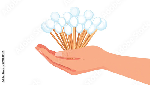 Hand holding cotton swabs in palm.