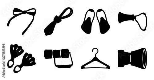 Set of black flat icons for travel accessories - Minimalist black flat icons showing various travel accessories like shoes, tie, luggage tags, and coat hanger for stock illustrations.