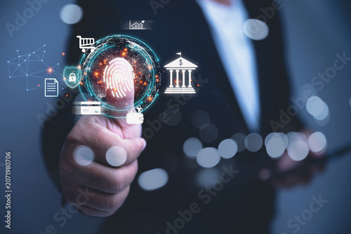 Businessman Verifying Identity via Fingerprint Scan with Cyber Security for Online Financial Transactions.