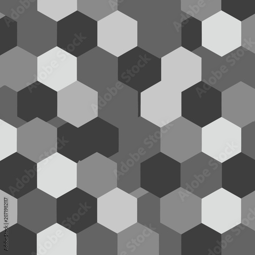Abstract monochrome hexagonal pattern with varying shades of gray and white. Seamless geometric design with subtle speckles.